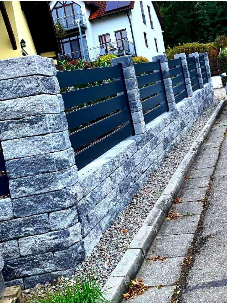 Aufbereitung von Zäunen und Fassaden